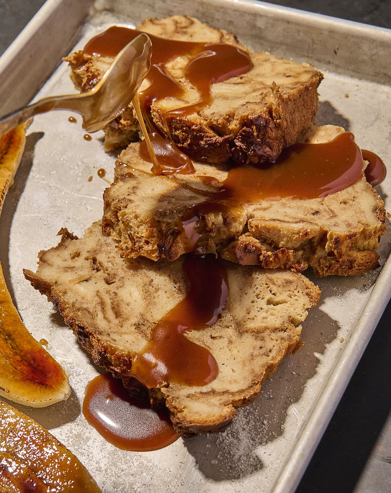Banana brioche pudding with caramelized bananas and syrup